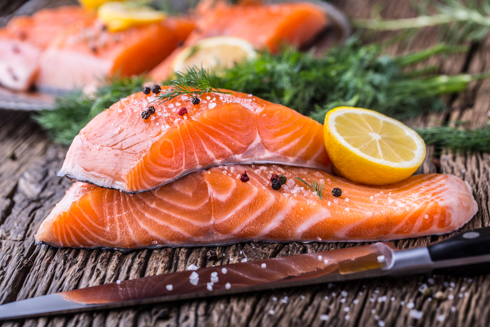 Two Salmon portions on a board